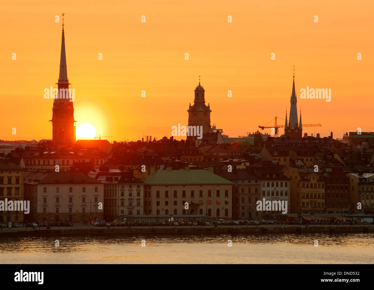 Sunset view of the  Skeppsbrokajen quay and Gamla Stan, the old town of Stockholm, Sweden. Seen from Fjällgatan, Södermalm. Stock Photo