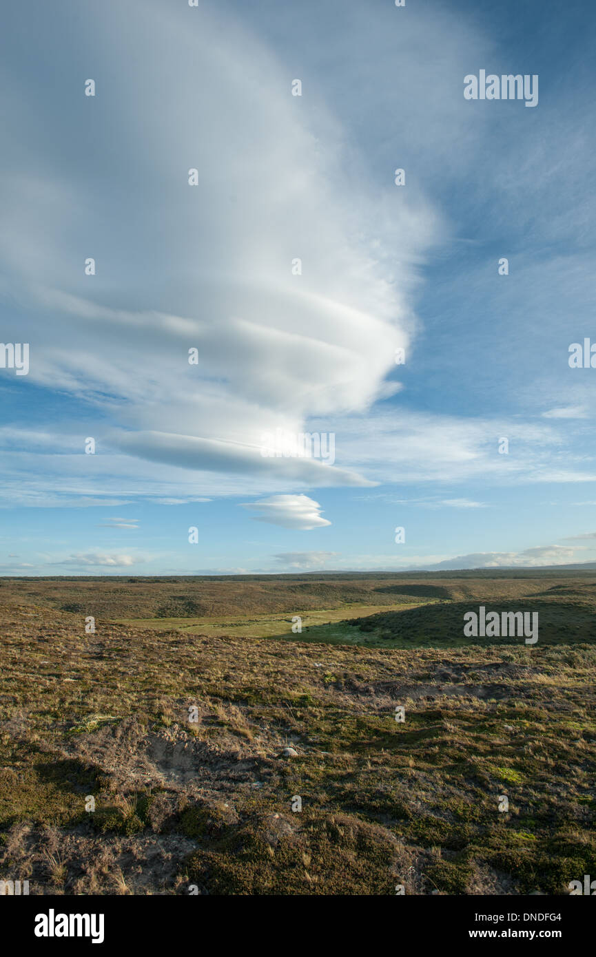 uneven ground with blue cloudy sky, Chile, south america Stock Photo