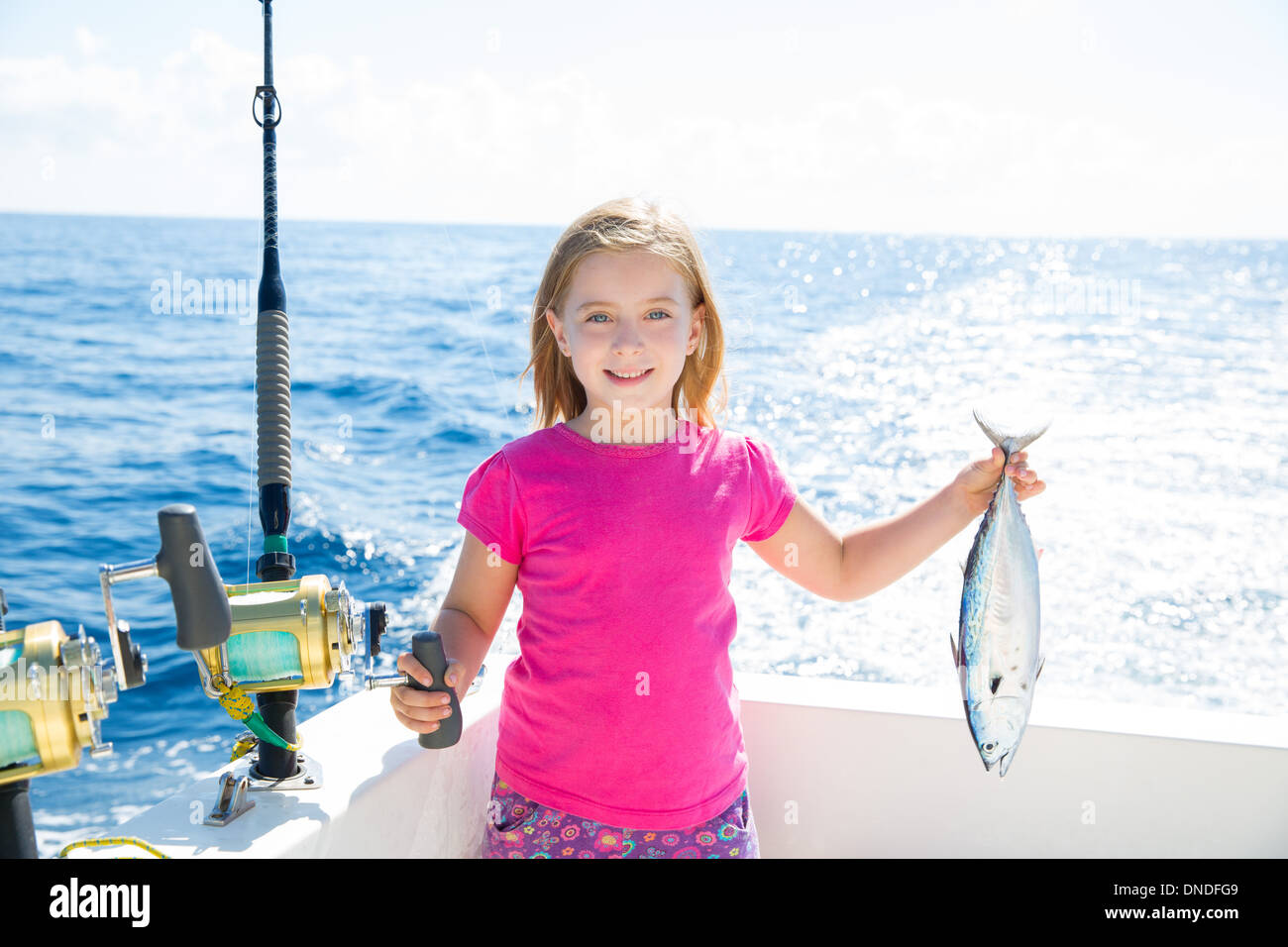 Girl holding fish fishing rod hi-res stock photography and images - Page 3  - Alamy