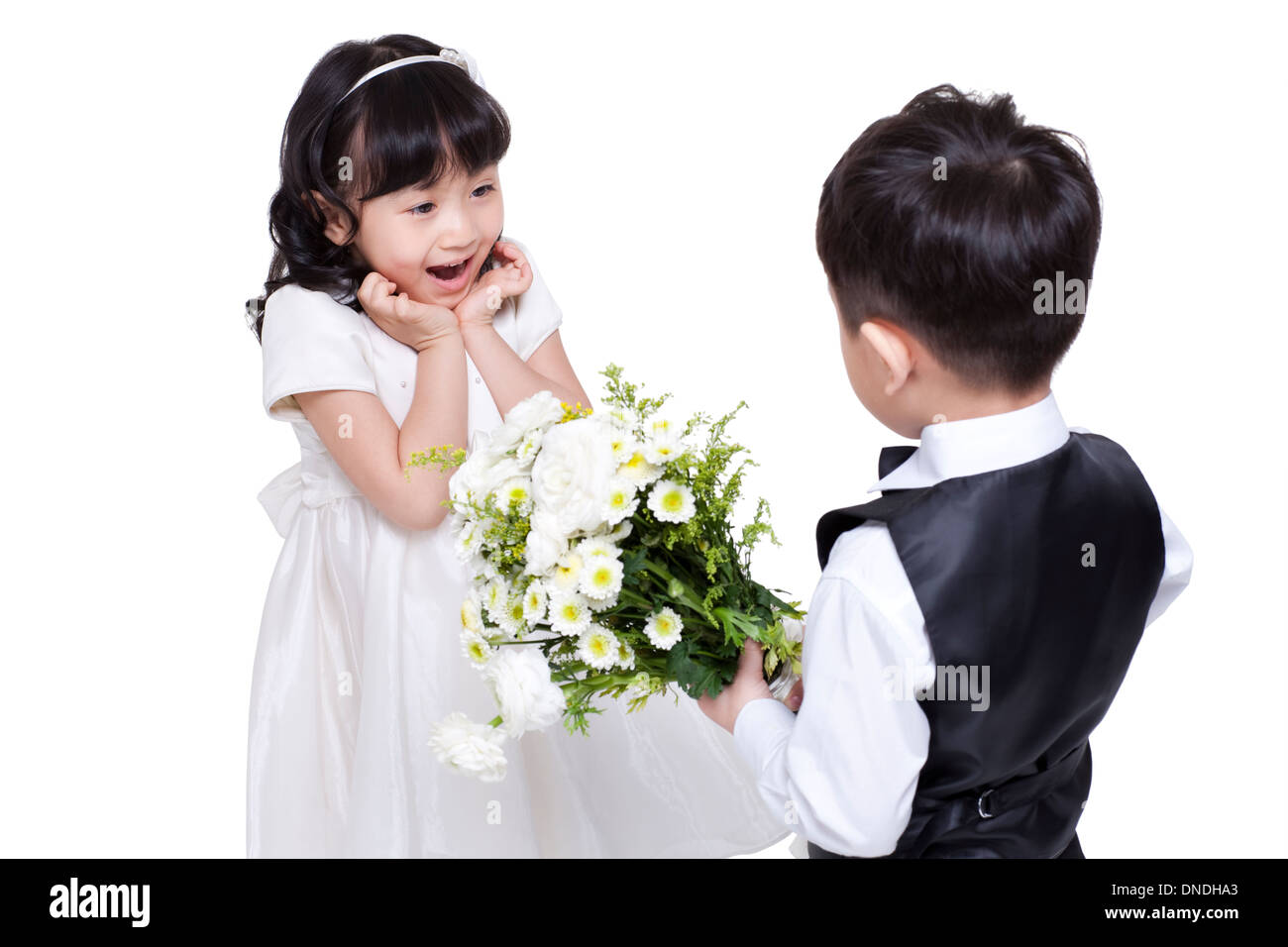 Lovely boy giving flowers to girl Stock Photo Alamy