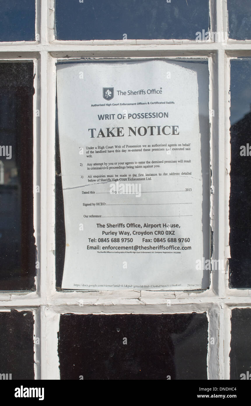 Writ of Possession posted on window of empty business premises