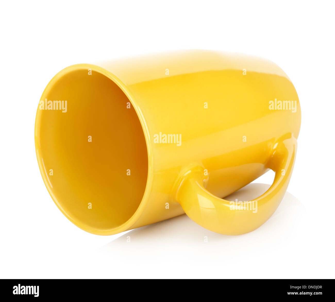 Yellow teacup isolated on a white background Stock Photo