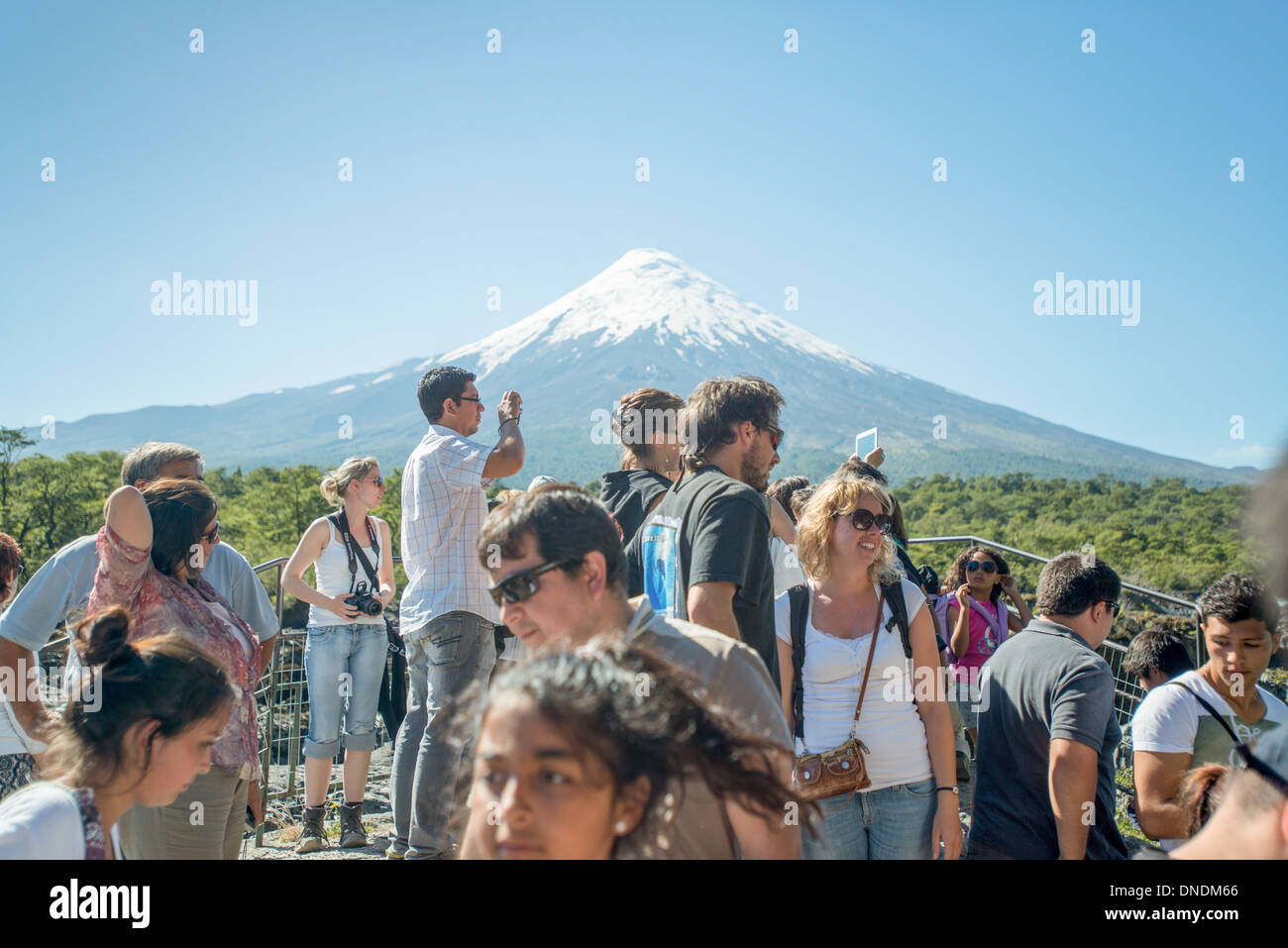 Tourists Observing Mountain in Chile Stock Photo