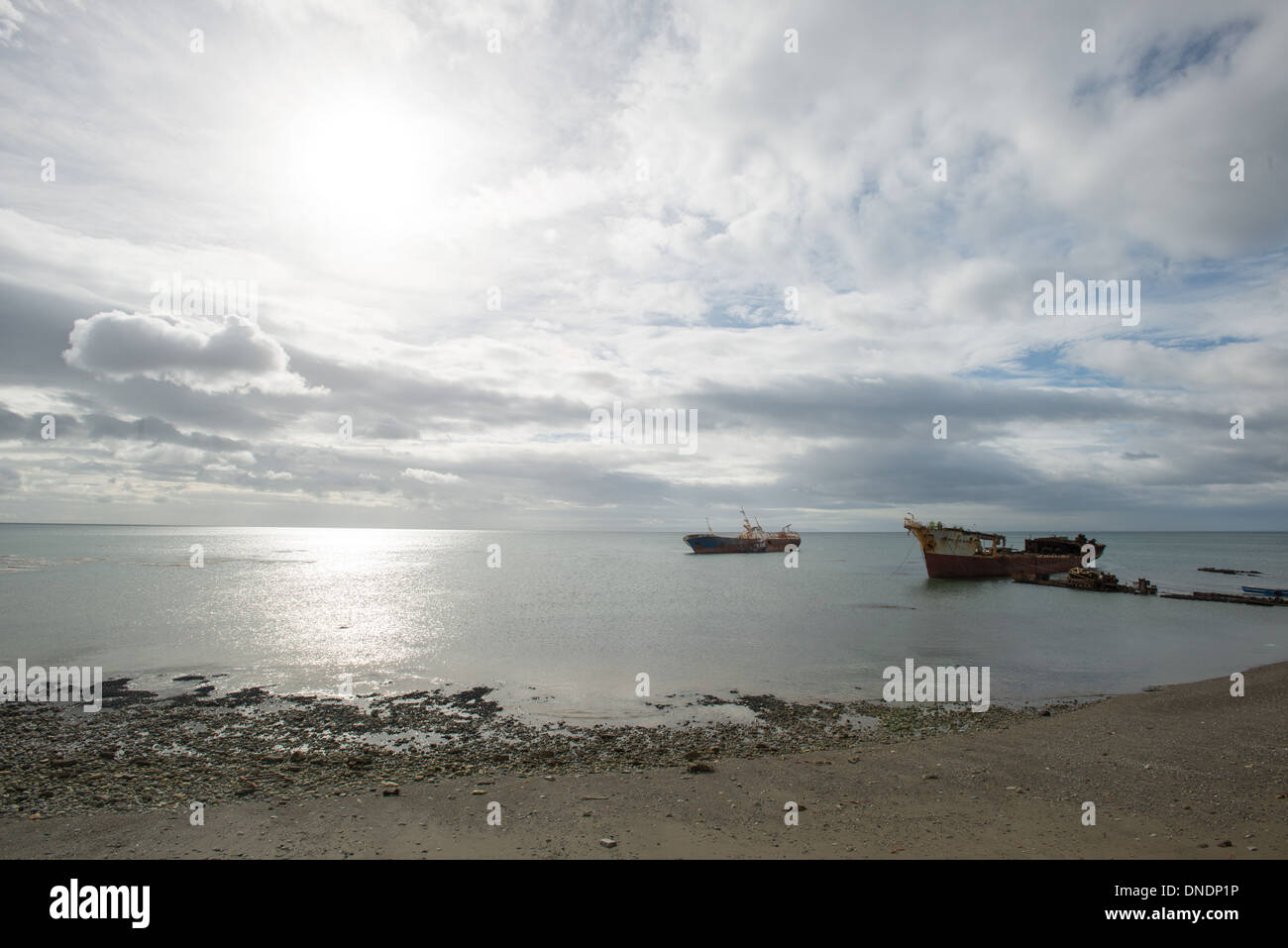 Grey Seashore with Fishing Boats Stock Photo