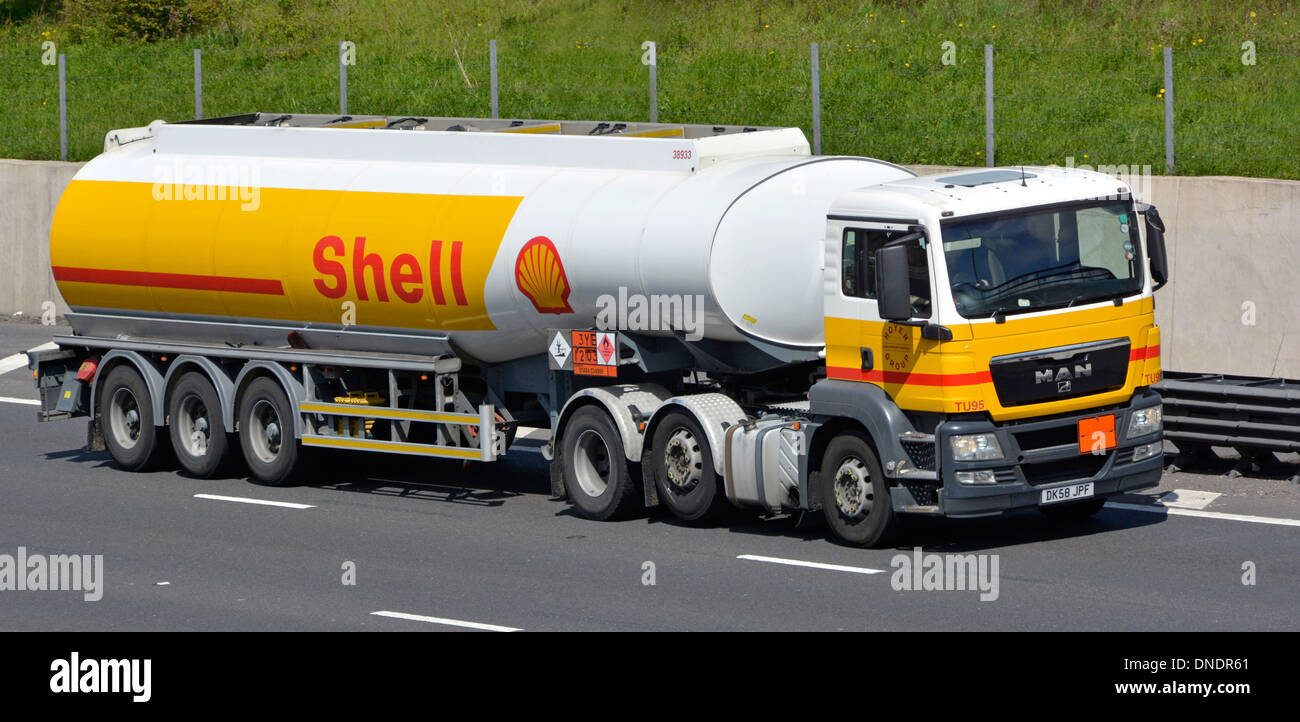 Hazchem Hazardous Chemicals and Dangerous Goods information sign & advertising on side of Shell fuel tanker on motorway Stock Photo