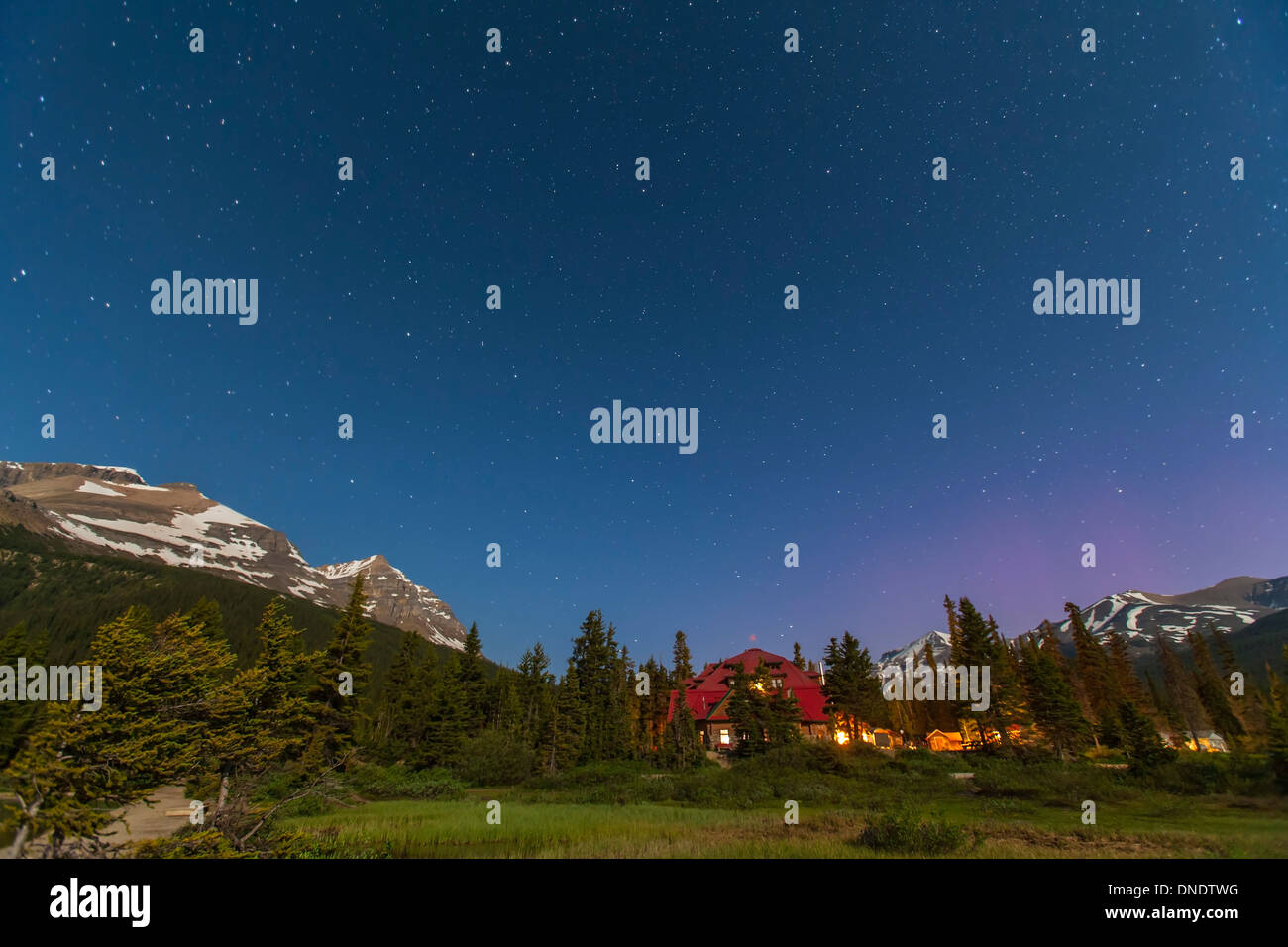 A moonlit nightscape taken in Banff National Park, Alberta Canada. Stock Photo