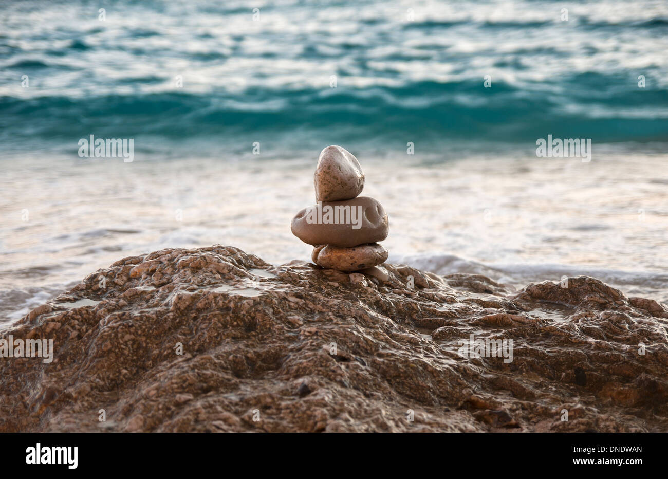 Stones stacked on beach hi-res stock photography and images - Alamy