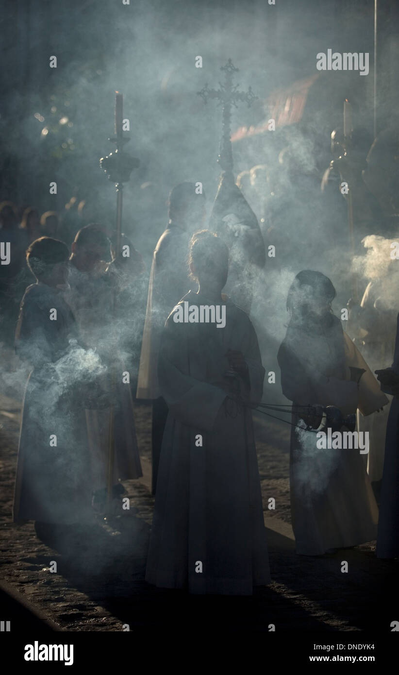 Acolytes spread incense during an Easter Holy Week procession in Prado del Rey, Andalusia, Spain, April 24, 2011. Stock Photo
