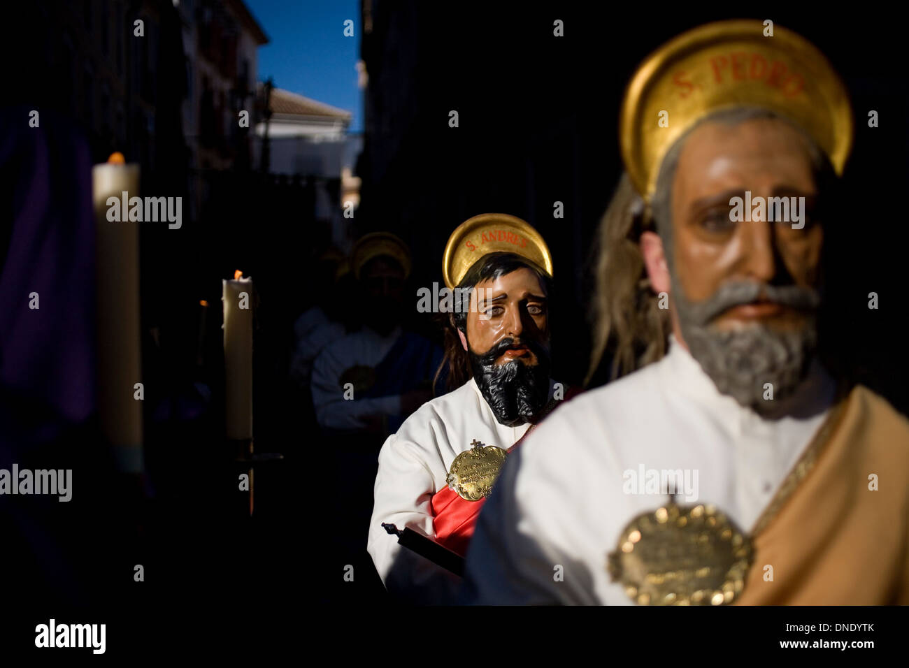 Men wearing masks and dressed as the apostles during Easter Holy Week