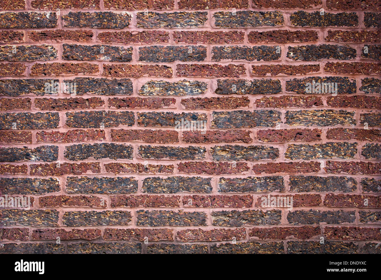 Laterite stone brick wall, bricklaying Indian style Stock Photo