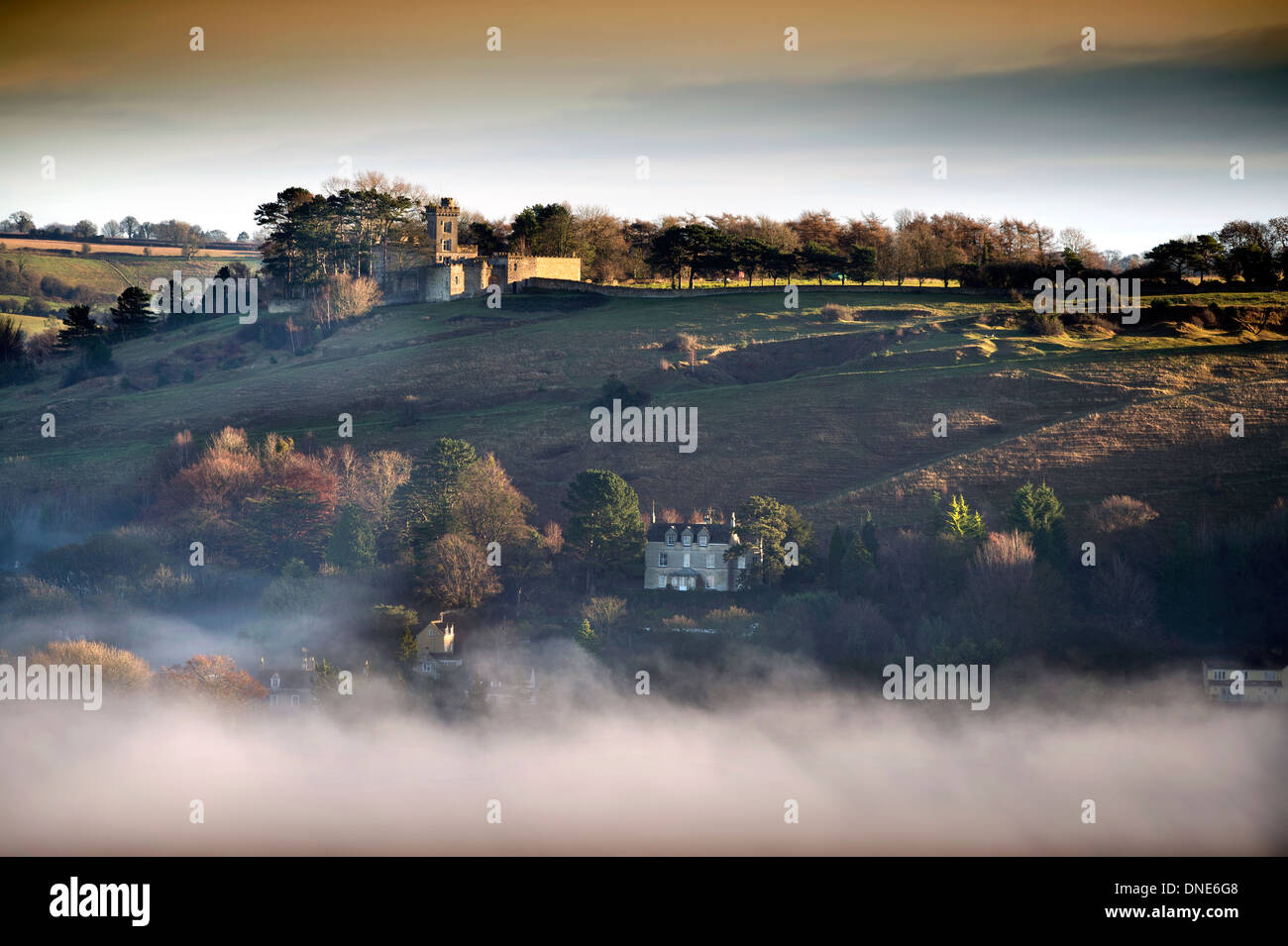 Misty morning in the Stroud Valley, Gloucestershire with Rodborough Fort UK Stock Photo