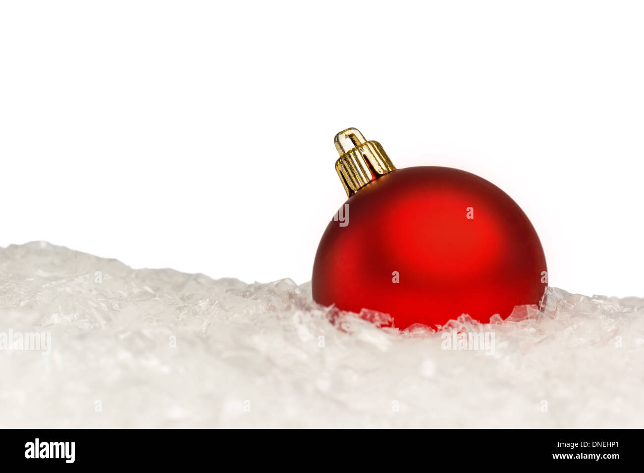 Red Christmas ball on a light background Stock Photo