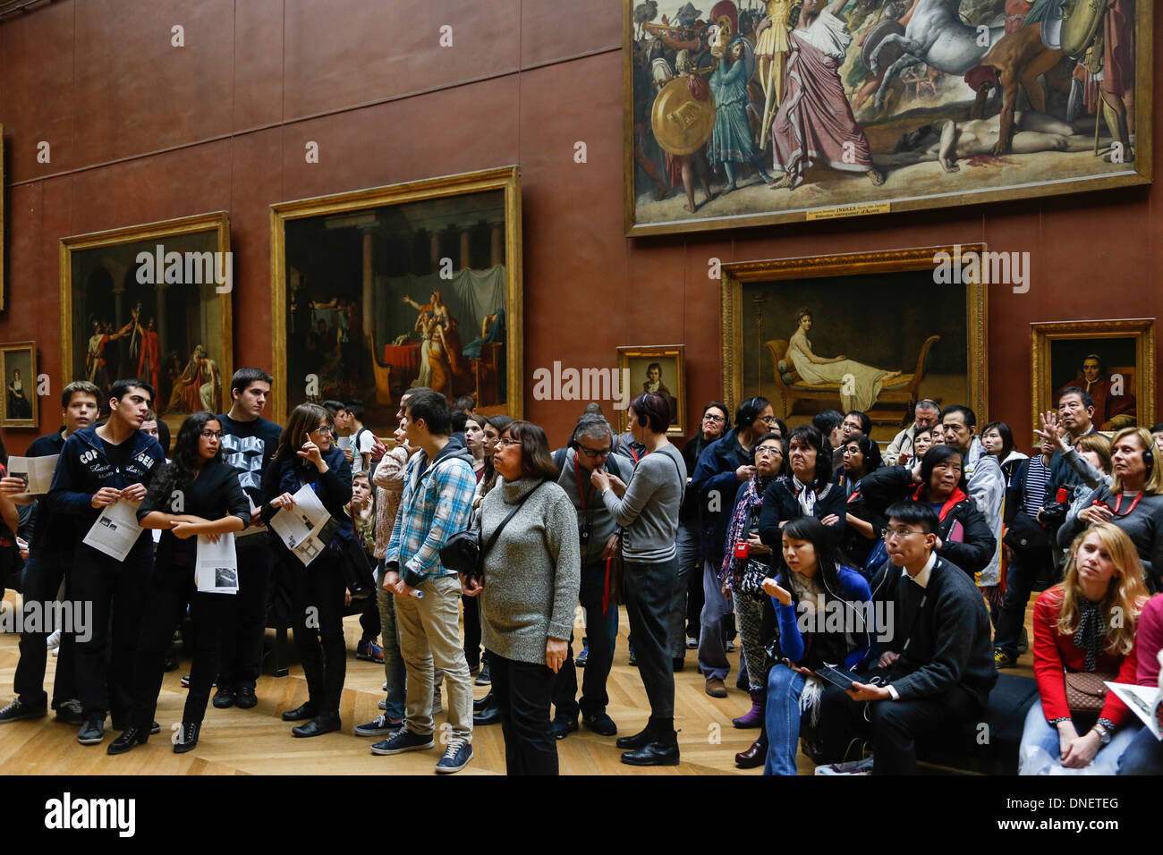 Tourists in the Grand Gallery, Louvre Museum, Paris France Stock Photo