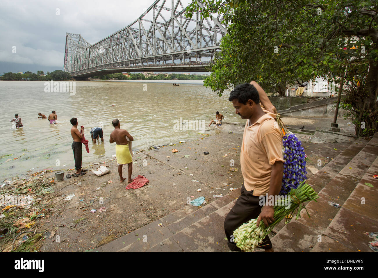 Howrah Bridge near flower market - Calcutta (Kolkata), India Stock Photo