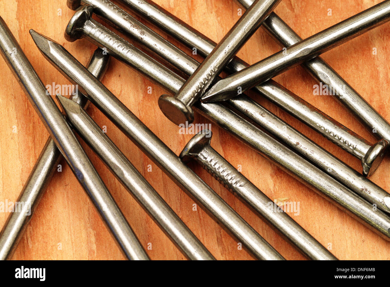 Nails On Plywood Stock Photo - Alamy
