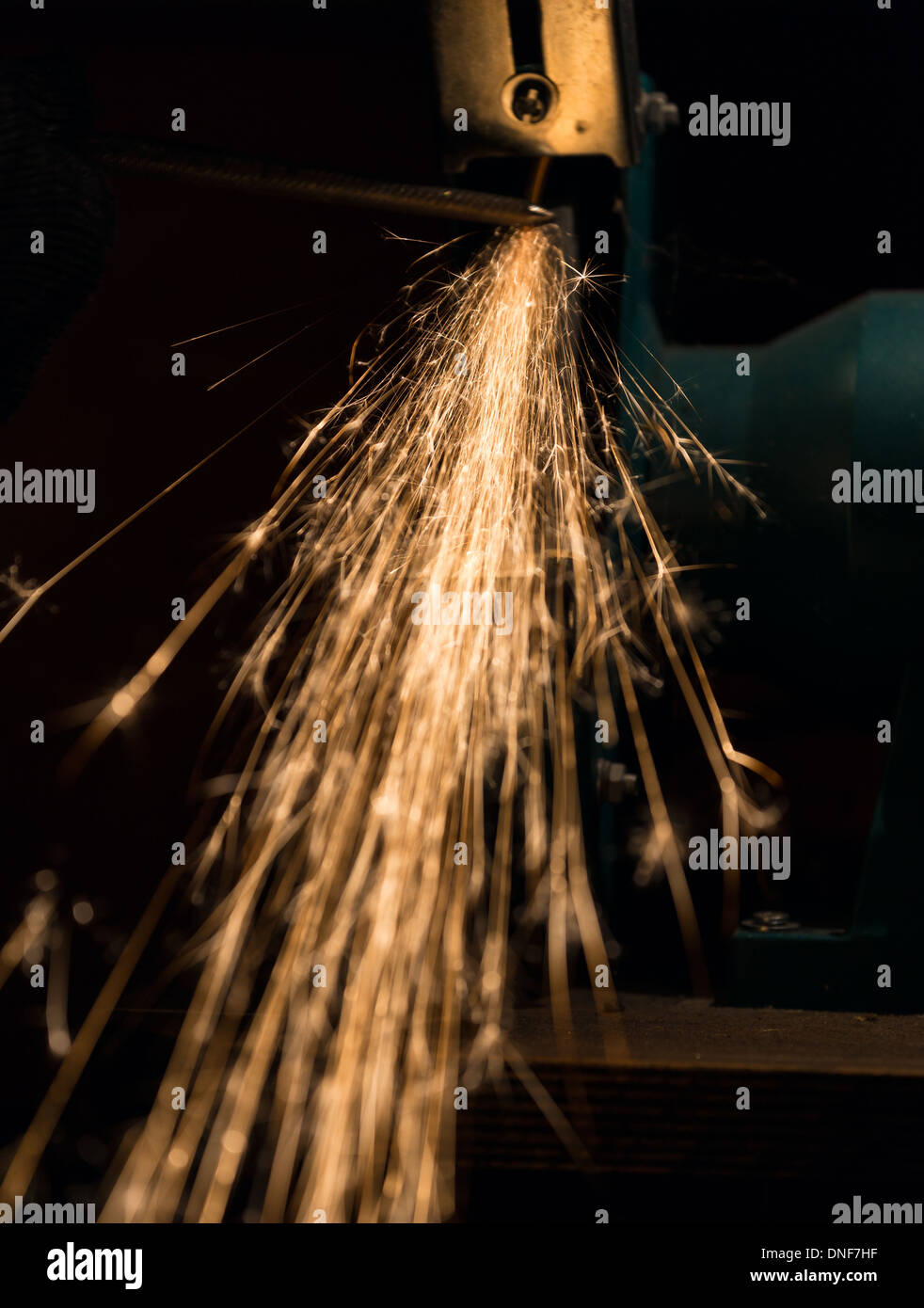 Sharp Iron sharpening and cutting of iron by abrasive disk machine Stock Photo - Alamy