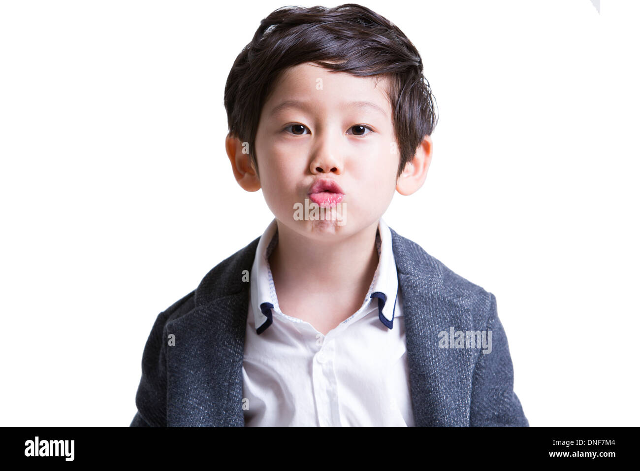 Cute little boy puckering his lips Stock Photo Alamy
