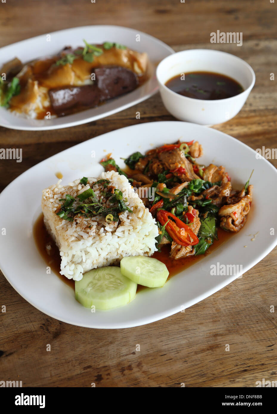 Fried pork with sweet basil and white jasmine sticky rice and Rice with