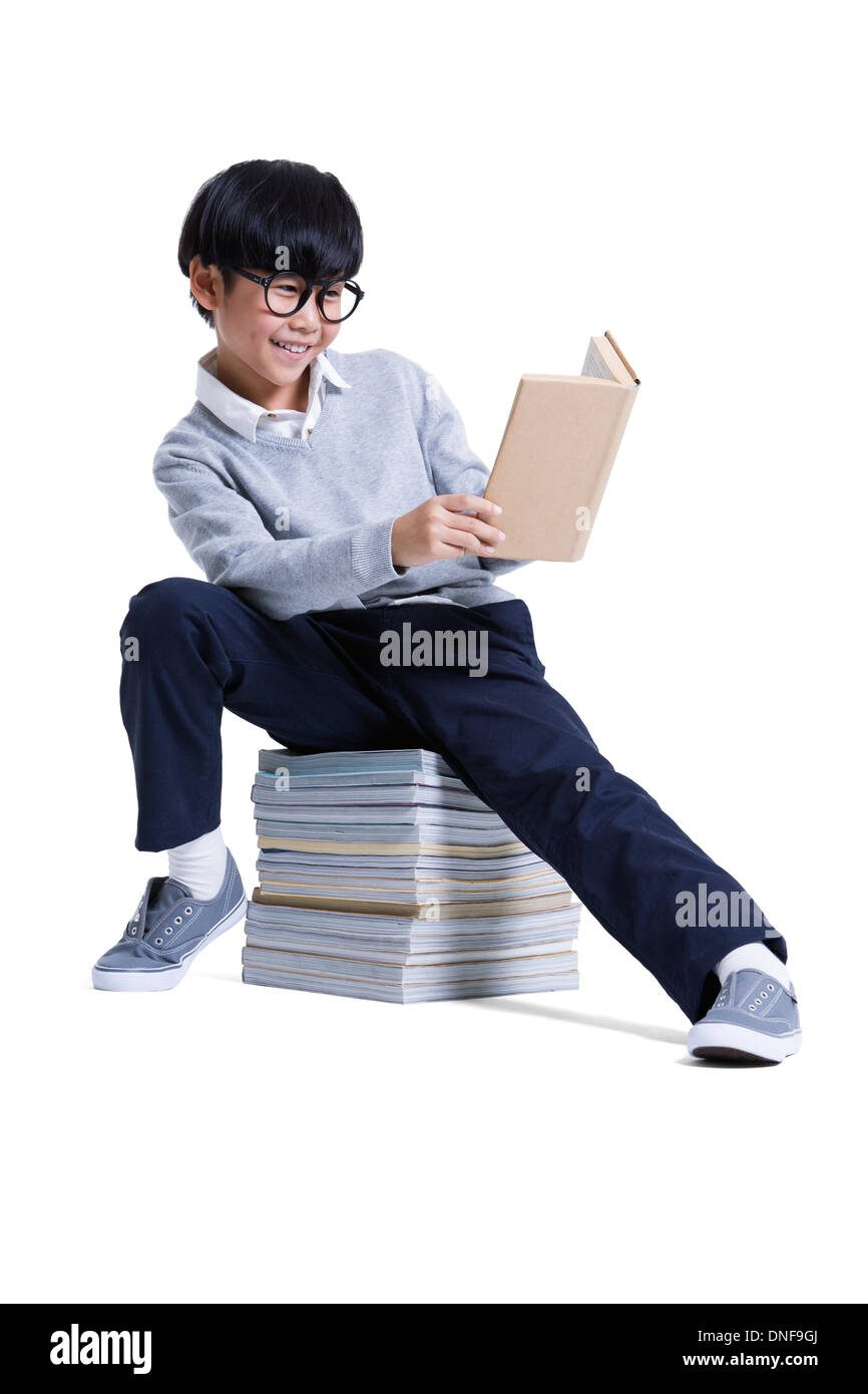 Cute boy reading Stock Photo