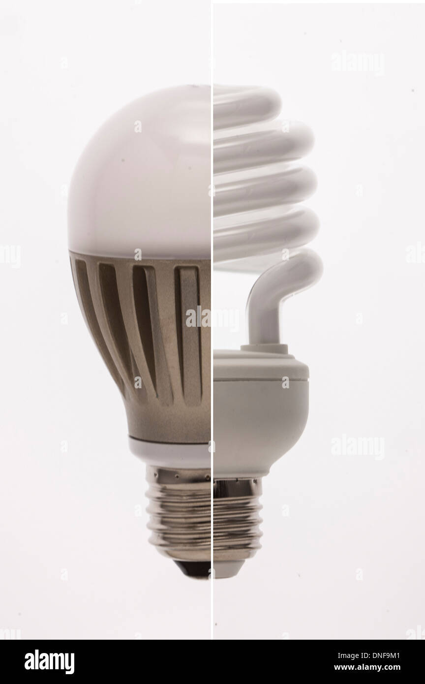 Normal light bulb versus energy efficient light bulb Stock Photo Alamy