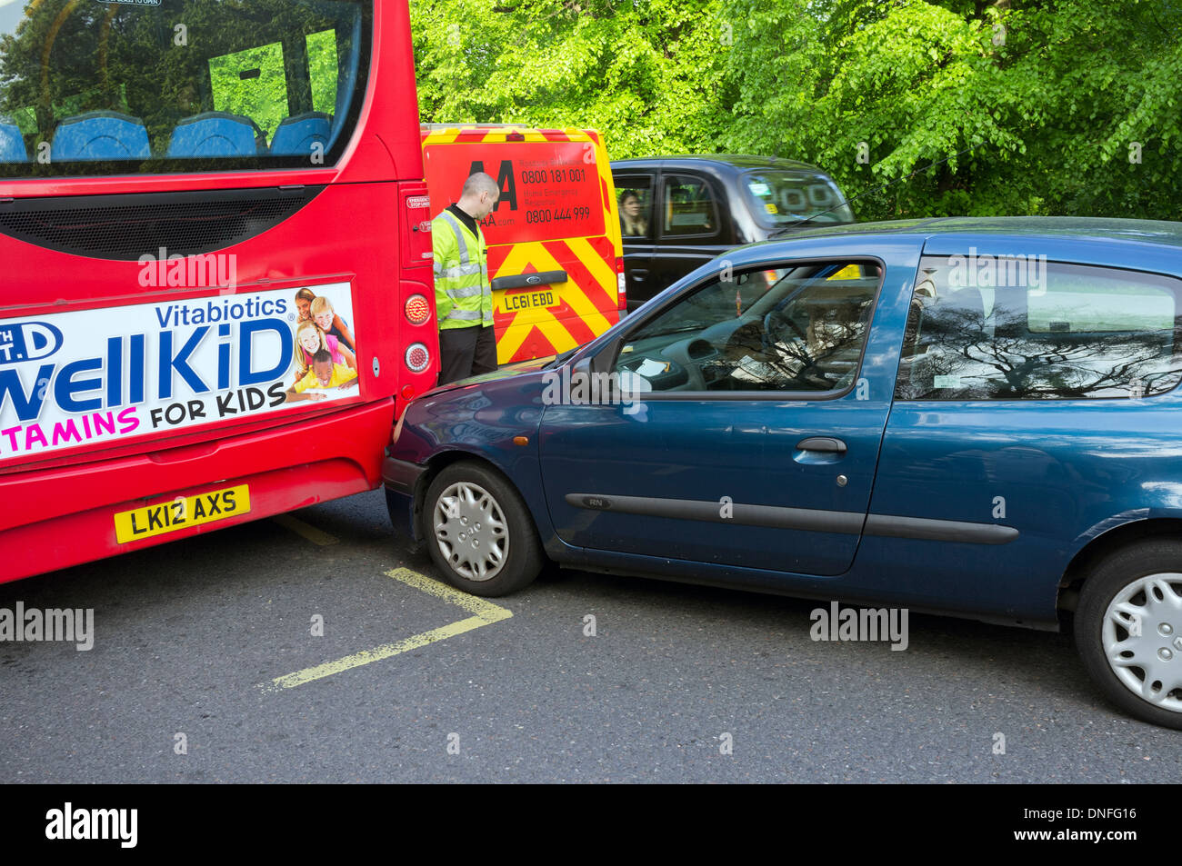 Car in collision with the rear end of a London bus Stock Photo