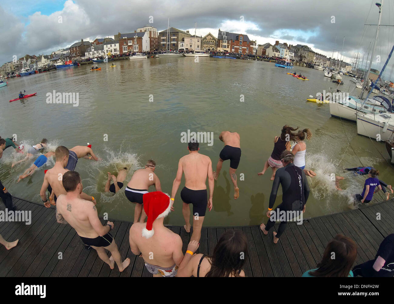 Christmas swim, Weymouth Harbour, Dorset, Britain, UK Stock Photo