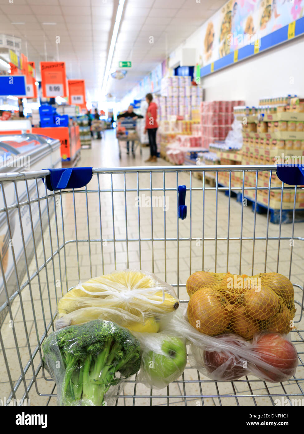 View Of A Shopping Cart With Grocery Items At Supermarket Stock Photo ...