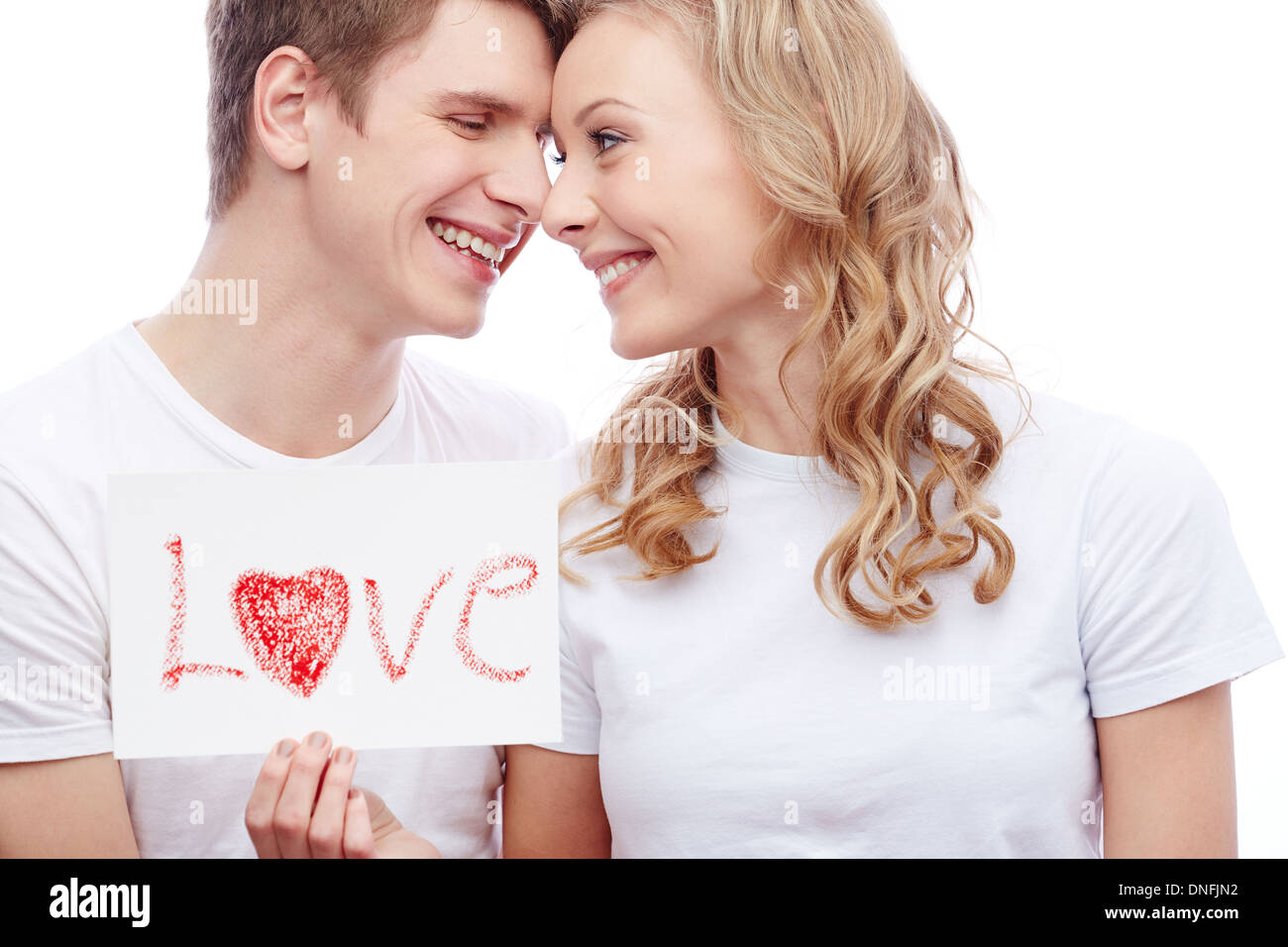 Young adult woman with word Love on her body Stock Photo - Alamy