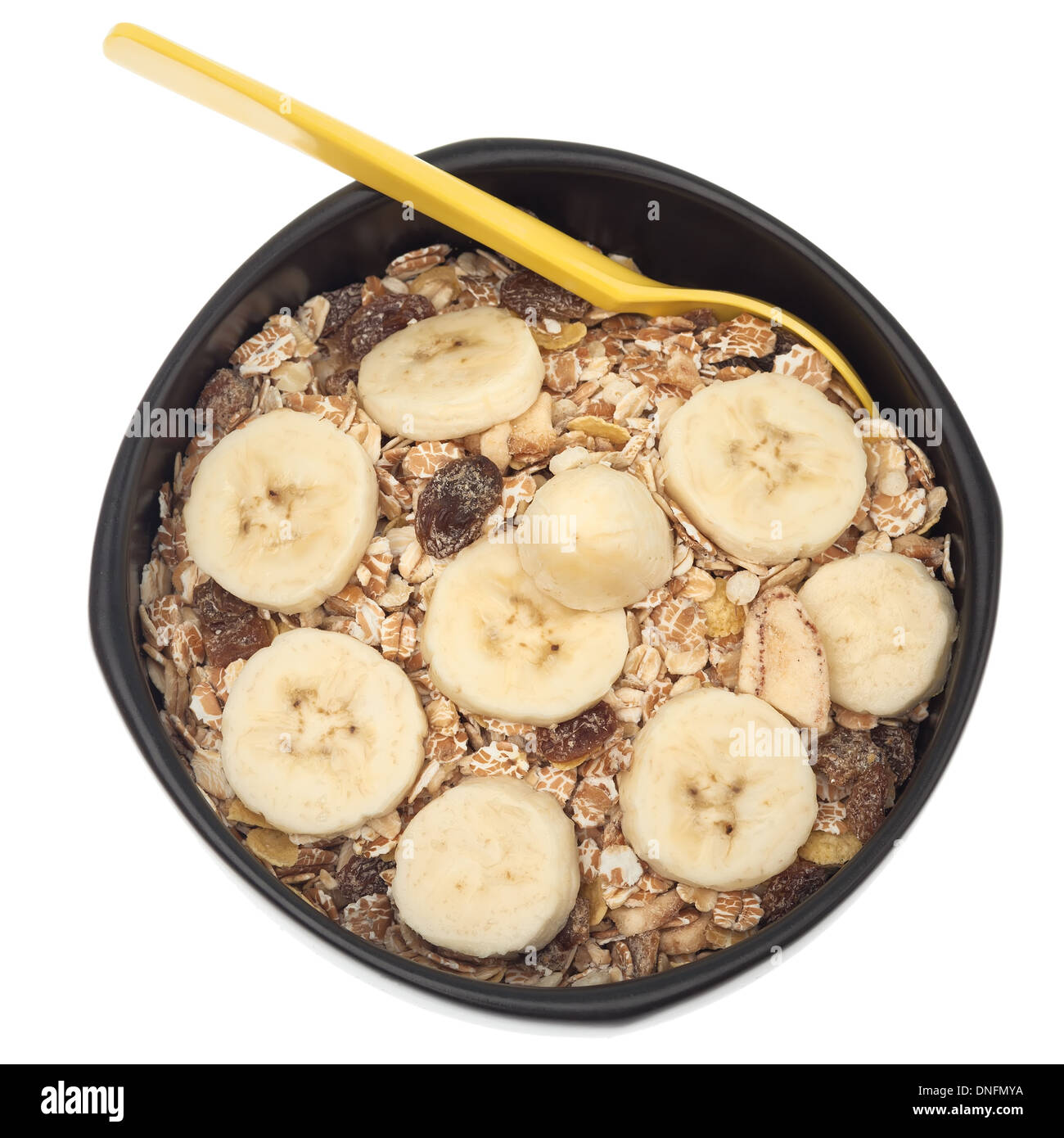 Healthy oatmeal with banana isolated on white background Stock Photo