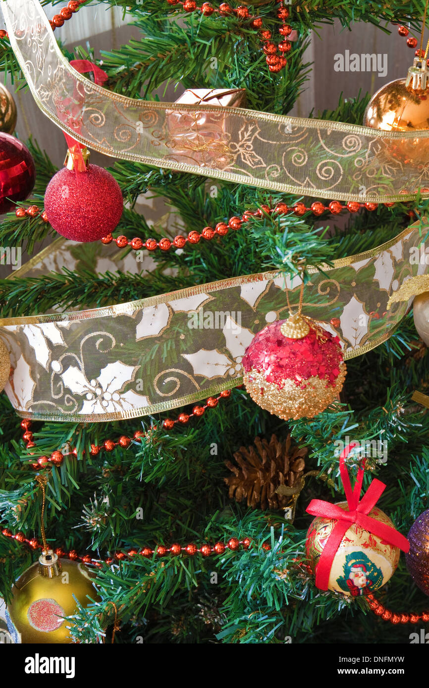 Traditional festive decorations on the evergreen tree to celebrate