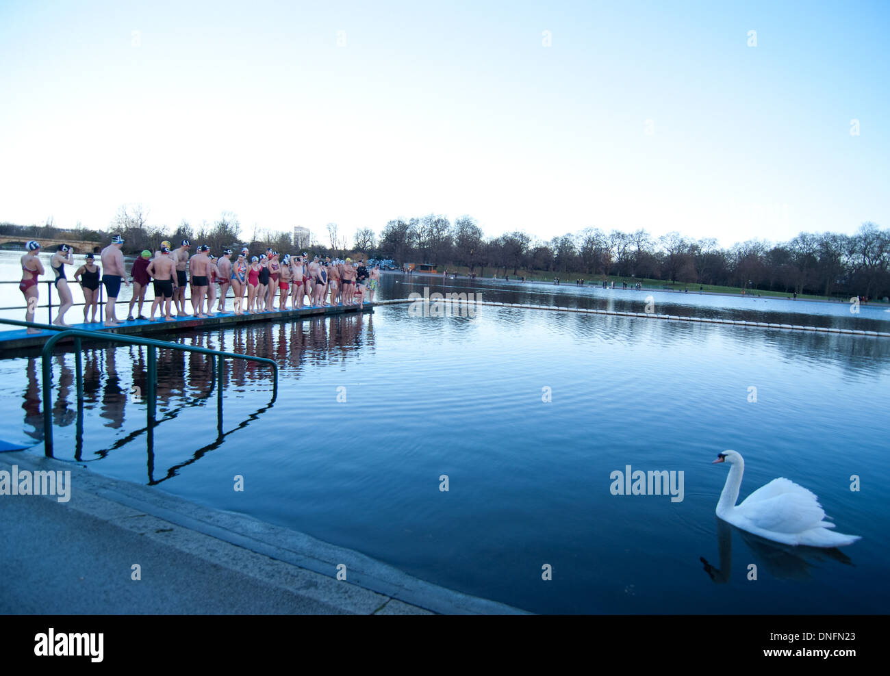 Members of the Serpentine Swimming Club prepare to swim in the icy Serpentine waters during the annual Christmas Day swim. The Peter Pan Cup Stock Photo