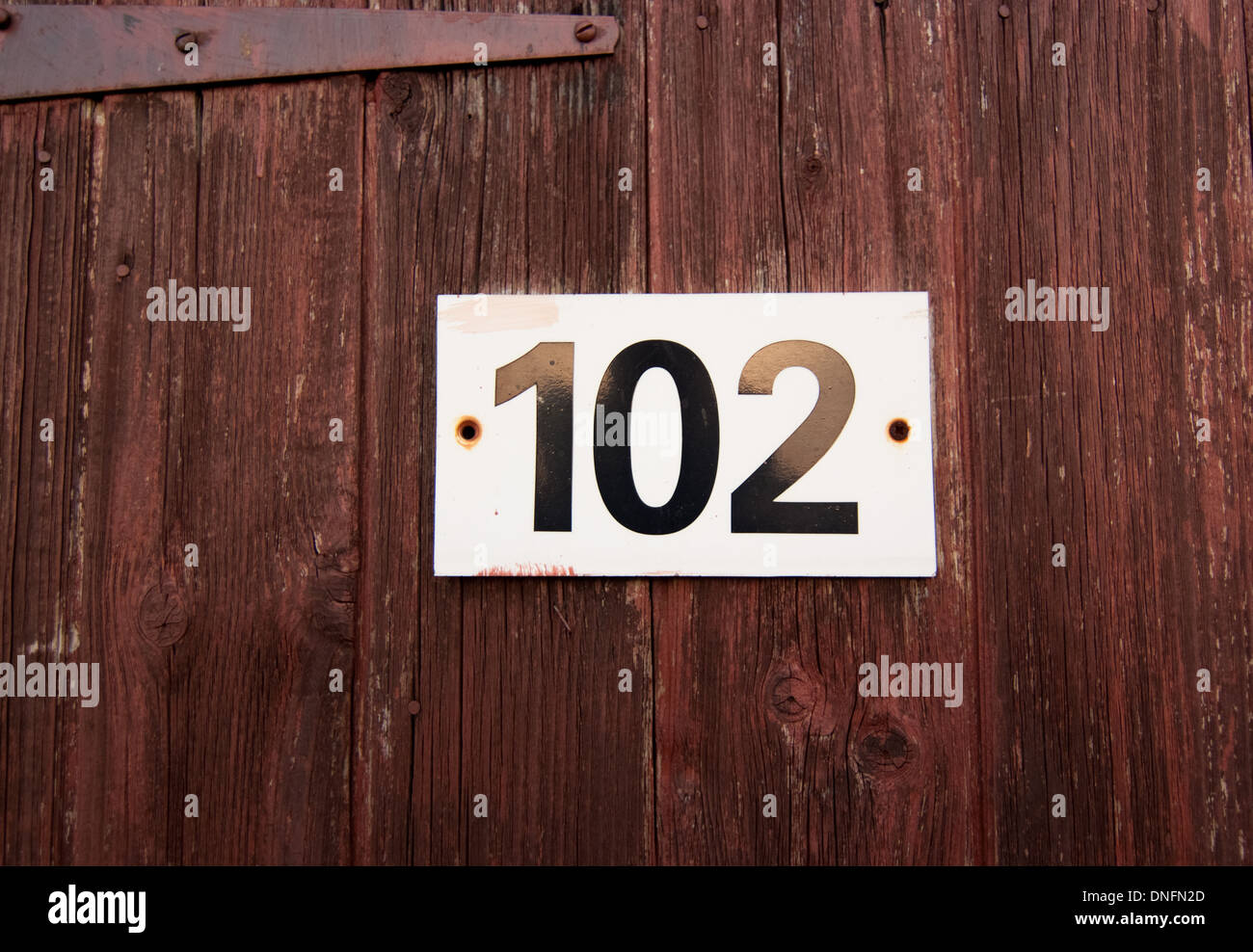 number 102 shed door on a allotment site Stock Photo