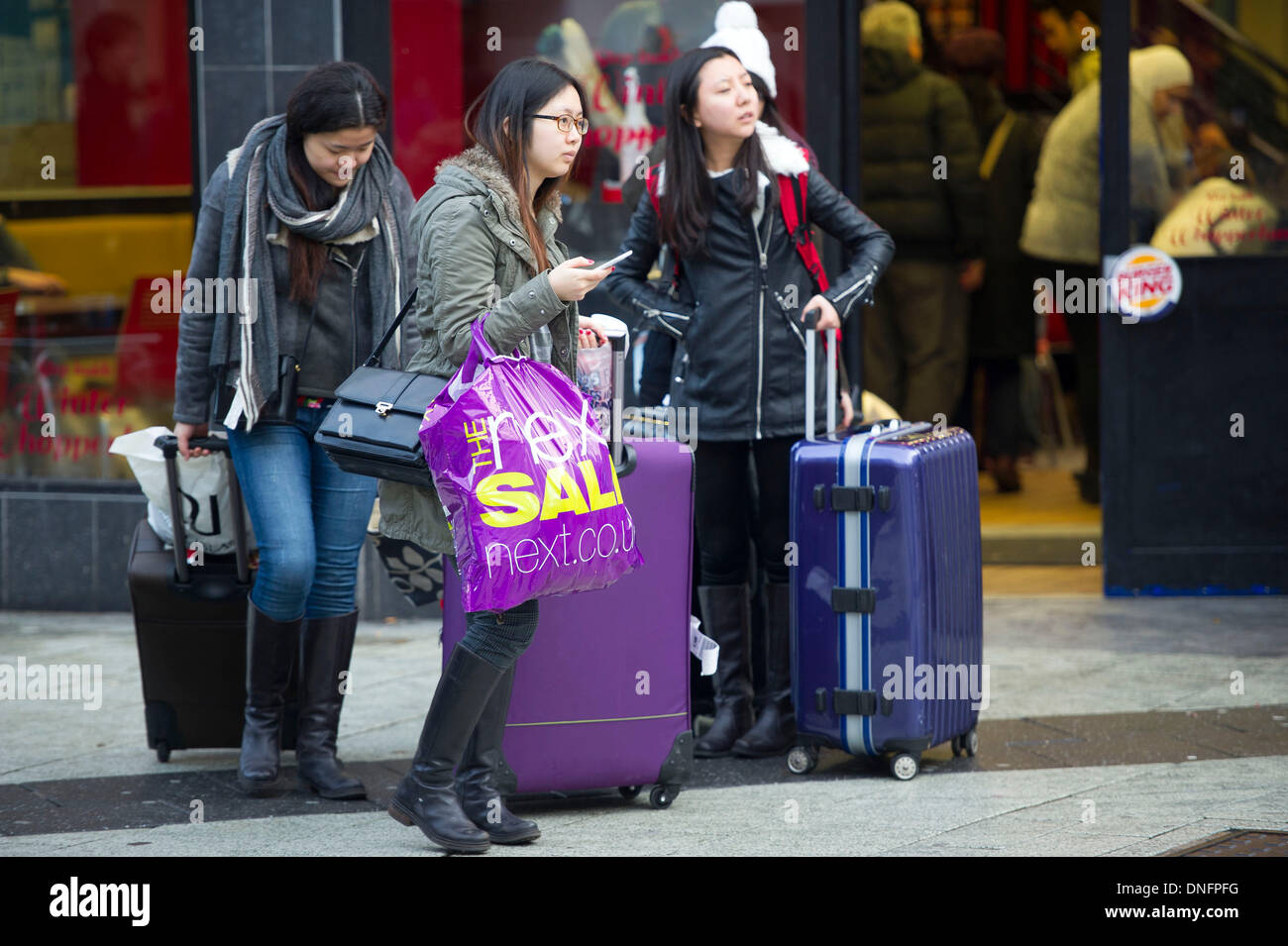 CARDIFF, WALES - December 26: Shoppers out looking for bargains in the Boxing Day sales on December 26, 2013 on Queen Street, Cardiff, Wales.  Credit:  Matthew Horwood/Alamy Live News Stock Photo