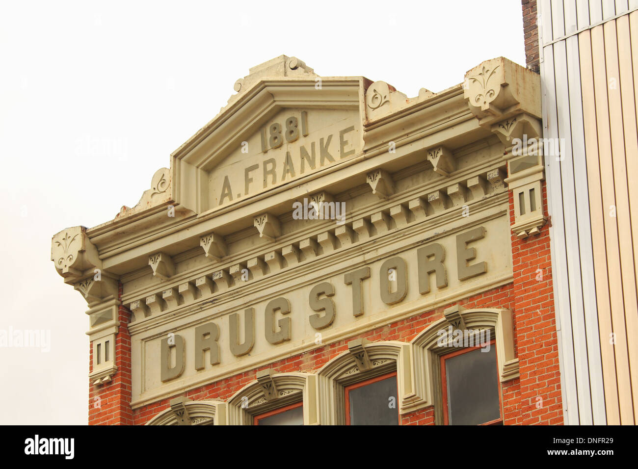 A. Franke building. Circa 1881. Drugstore. Architecture. Wapakoneta, Ohio, USA. A lot of dirt and bad paint visible. Stock Photo