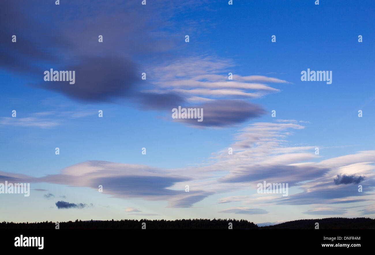 Lenticular clouds over the Cascade Mountains in central Oregon Stock Photo
