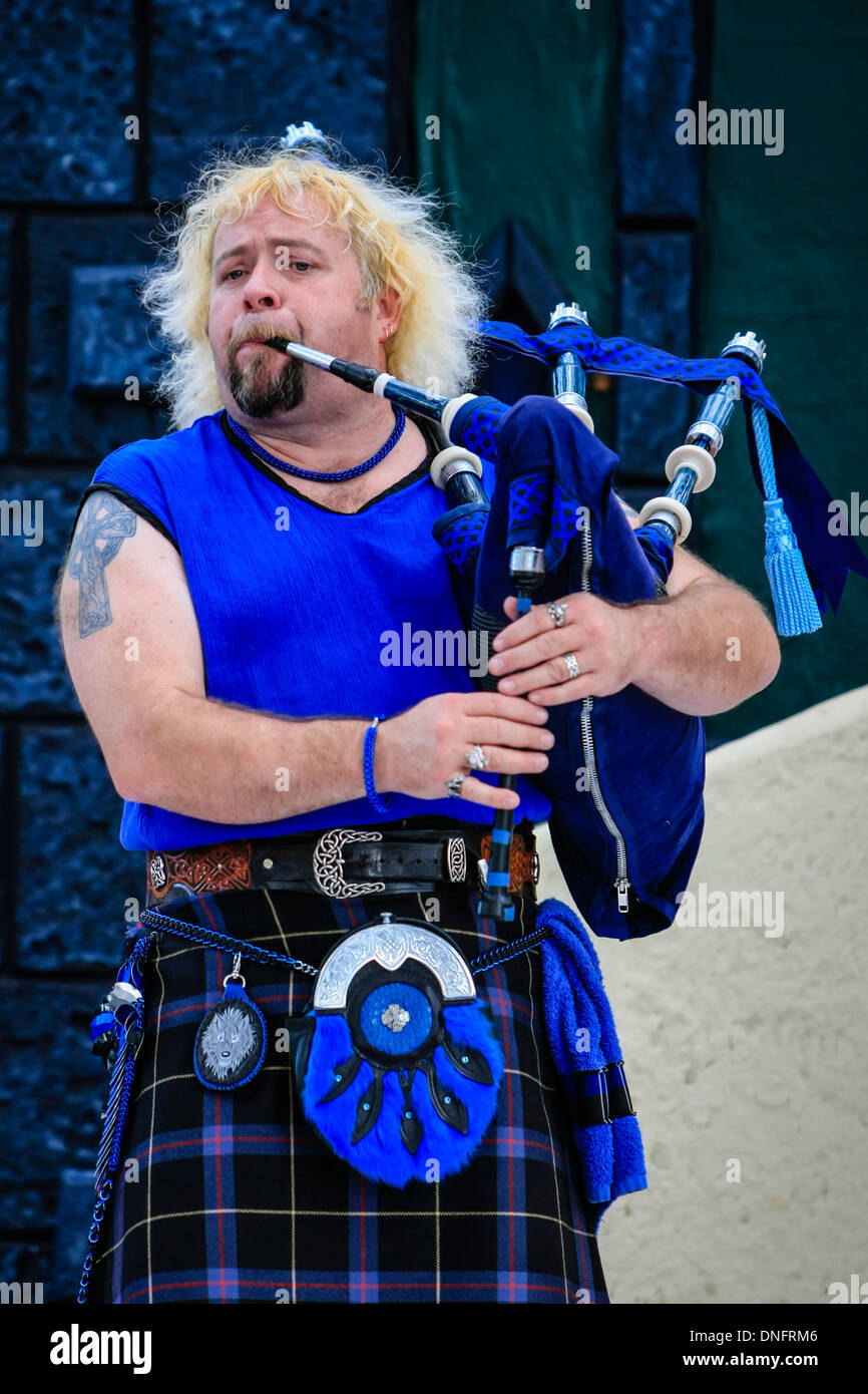 Scottish musician playing the bagpipes at a Sarasota Fair in Florida Stock Photo