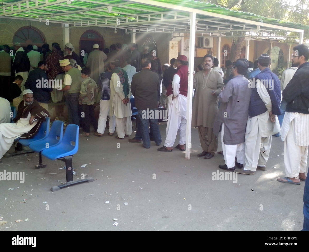 Large numbers of citizens are in queue to submit their computerized ...