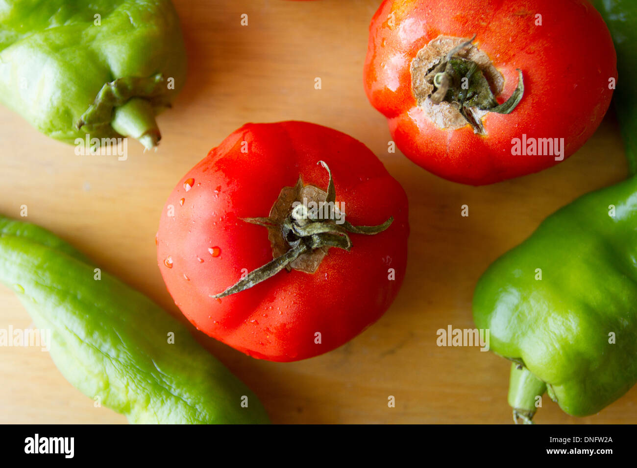 Tomatoes and green peppers Stock Photo Alamy