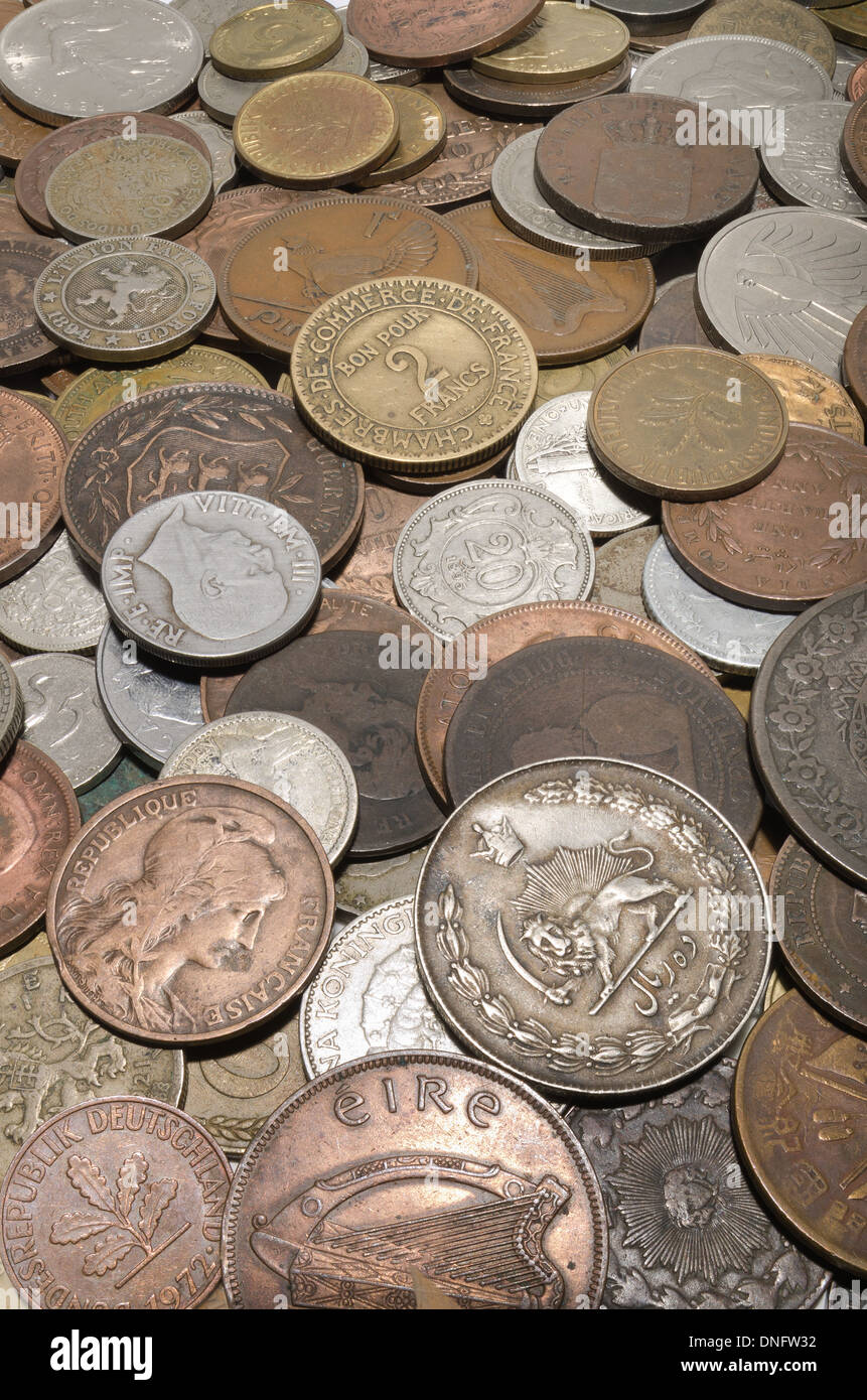 old foreign currency multicultural wealth as small change Stock Photo