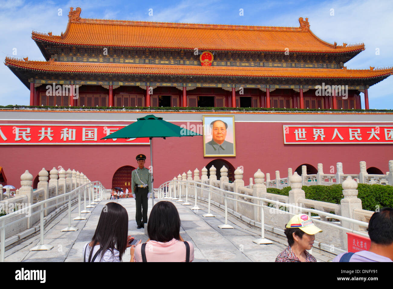 Beijing China,Chinese,Dongcheng District,Chang'an Avenue,Tian'anmen,Tiananmen,Imperial City,Chinese characters hànzì pinyin,Asian police,policeman,gat Stock Photo