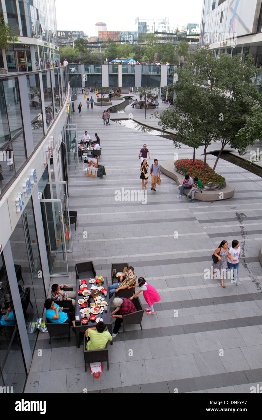 Beijing China,Chinese,Chaoyang District,Sanlitun Village,South North Piazza Deck,shopping shopper shoppers shop shops market markets marketplace buyin Stock Photo