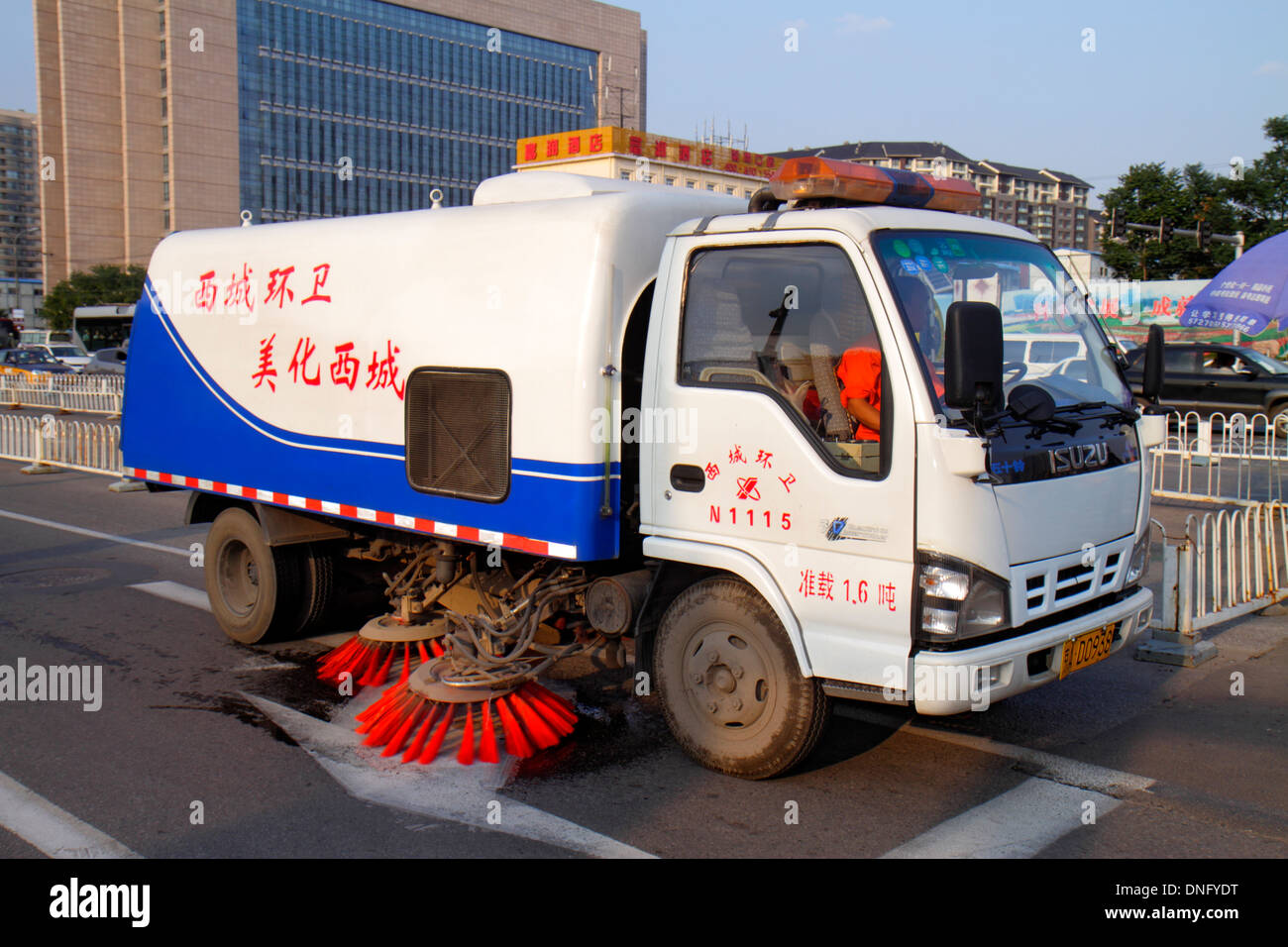 Beijing China,Chinese,Xicheng District,Guang An Men Nei Da Jie,Guanganmen Inner Street,sweeper,cleaning,China130918714 Stock Photo