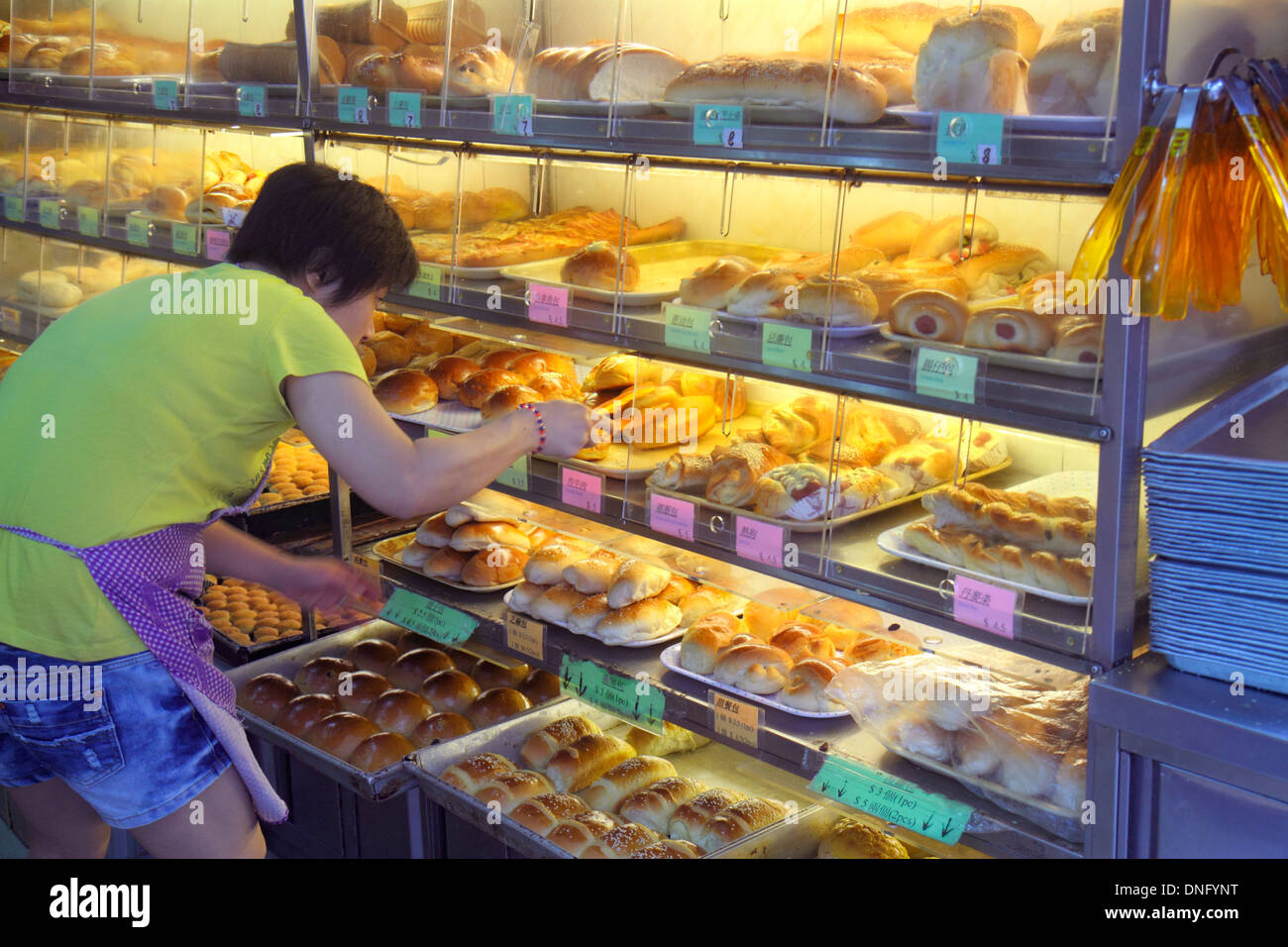 Hong Kong China,HK,Asia,Chinese,Oriental,Island,North Point,Java Road,bakery,pastry shop,interior inside,Asian adult,adults,woman female women,manager Stock Photo