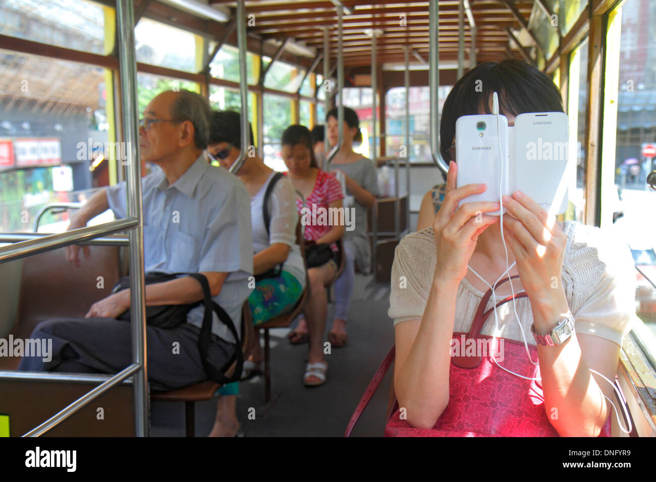 Hong Kong China,HK,Asia,Chinese,Oriental,Island,King's Road,double decker tram Tramways,Cantonese Chinese characters hànzì pinyin,interior inside,pass Stock Photo