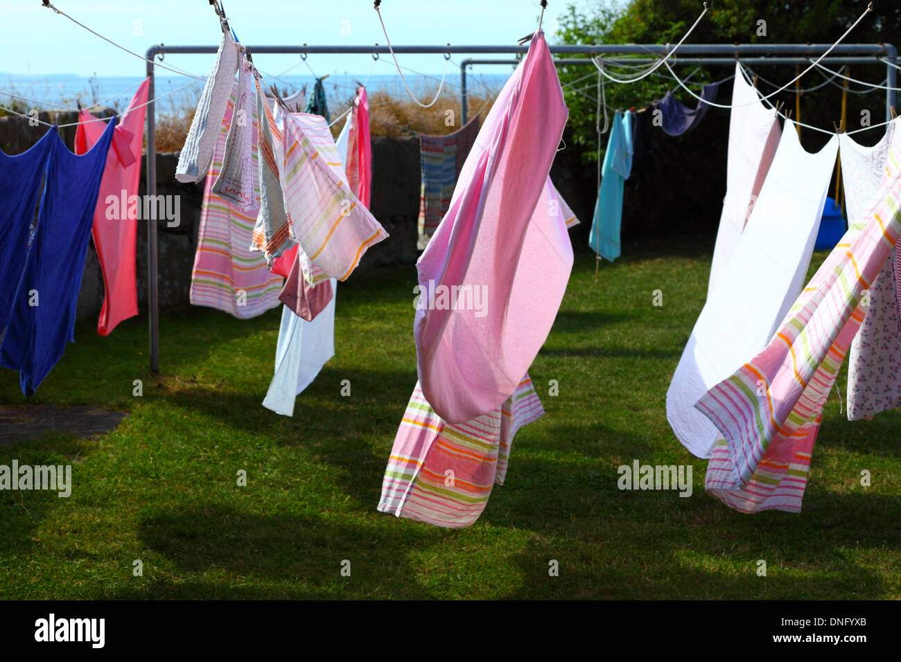 clothes hanging to dry on a laundry line outdoor Stock Photo Alamy