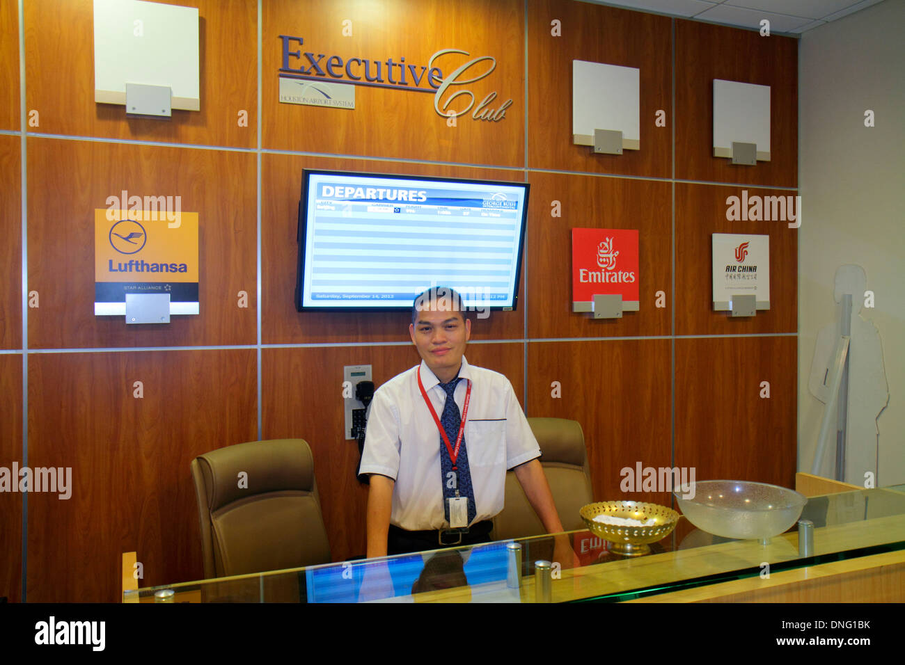 Texas,Houston,TX,Southwest,George Bush Intercontinental Airport,IAH,terminal,gate,Executive Club,airport lounge,class,front desk check in reception re Stock Photo