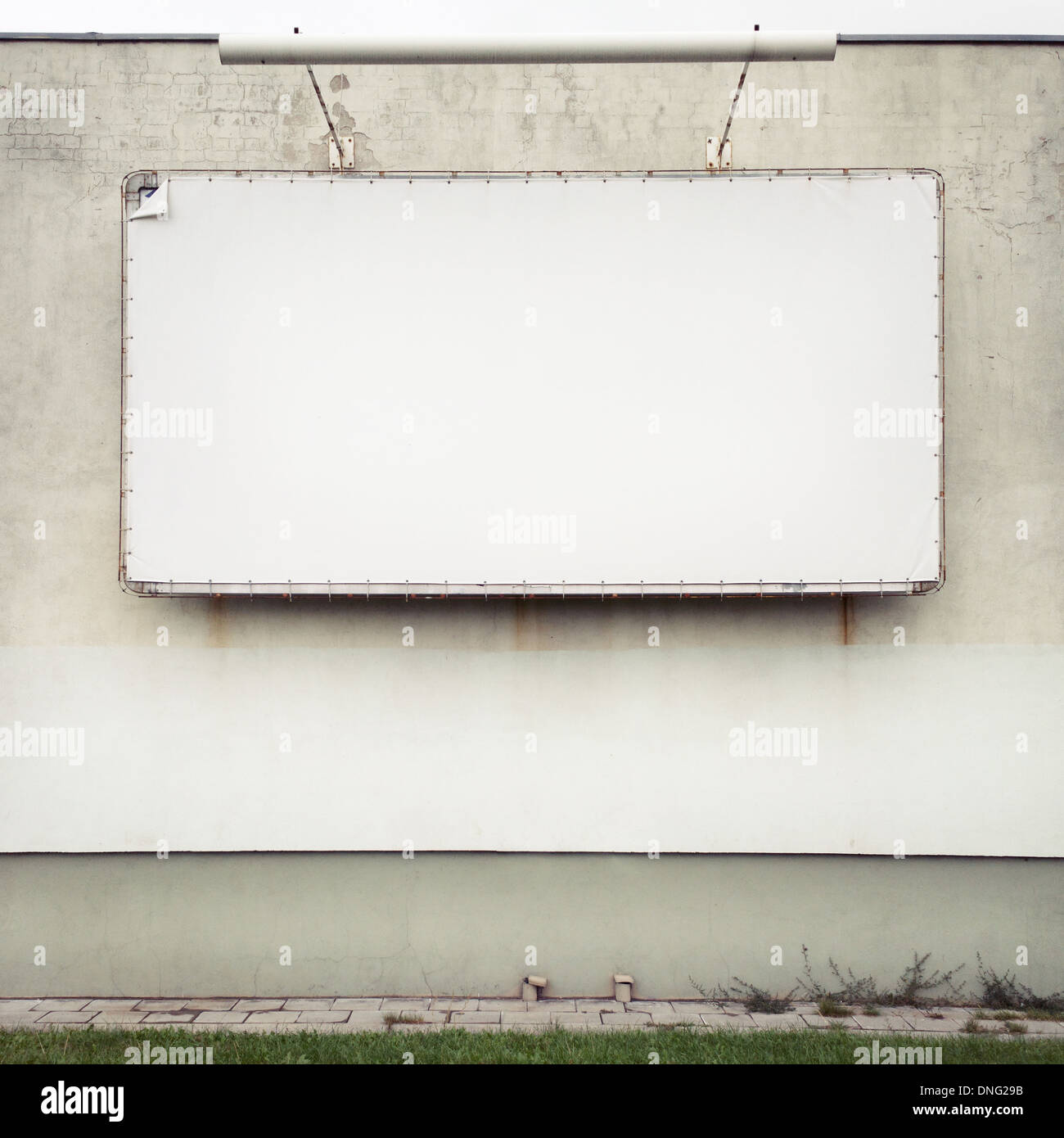 Blank advertising billboard on a street wall. Stock Photo