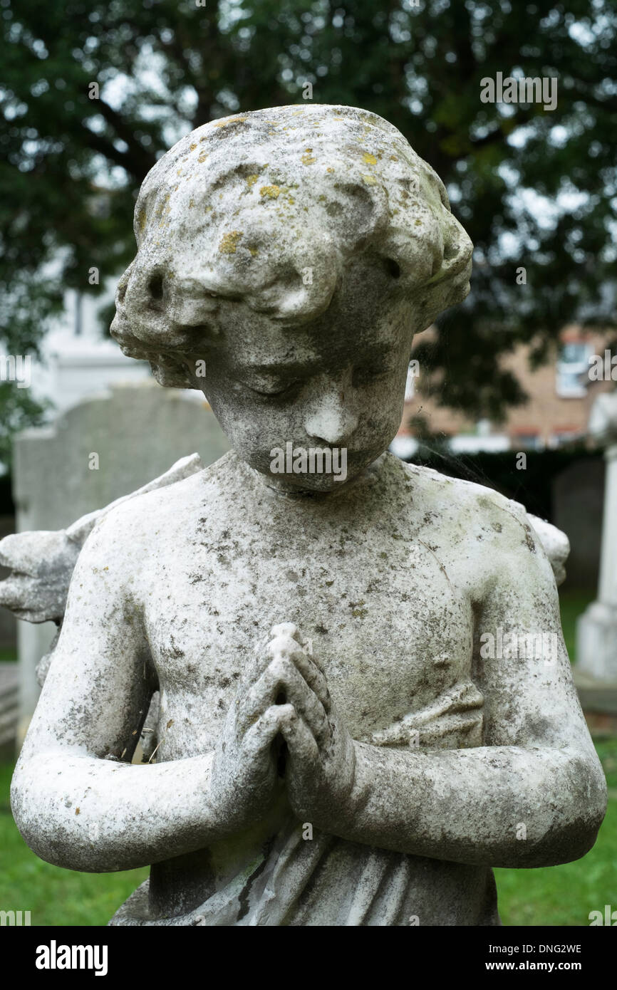 A praying angel headstone, Worthing. Picture by Julie Edwards Stock Photo