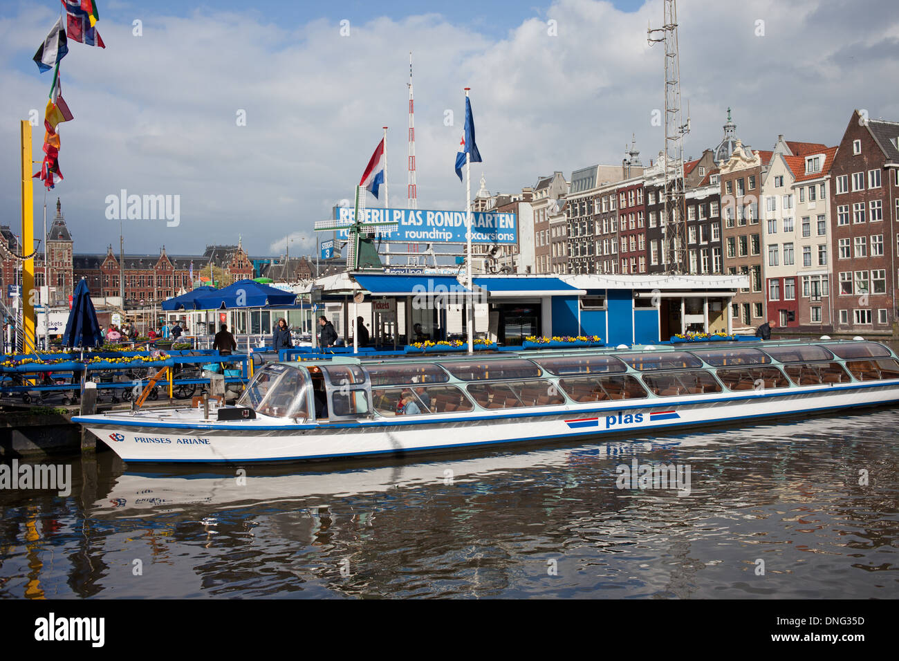 Rederij Plas passenger boat ready for tours and cruises, docked at pier on a canal in Amsterdam, Holland, the Netherlands. Stock Photo