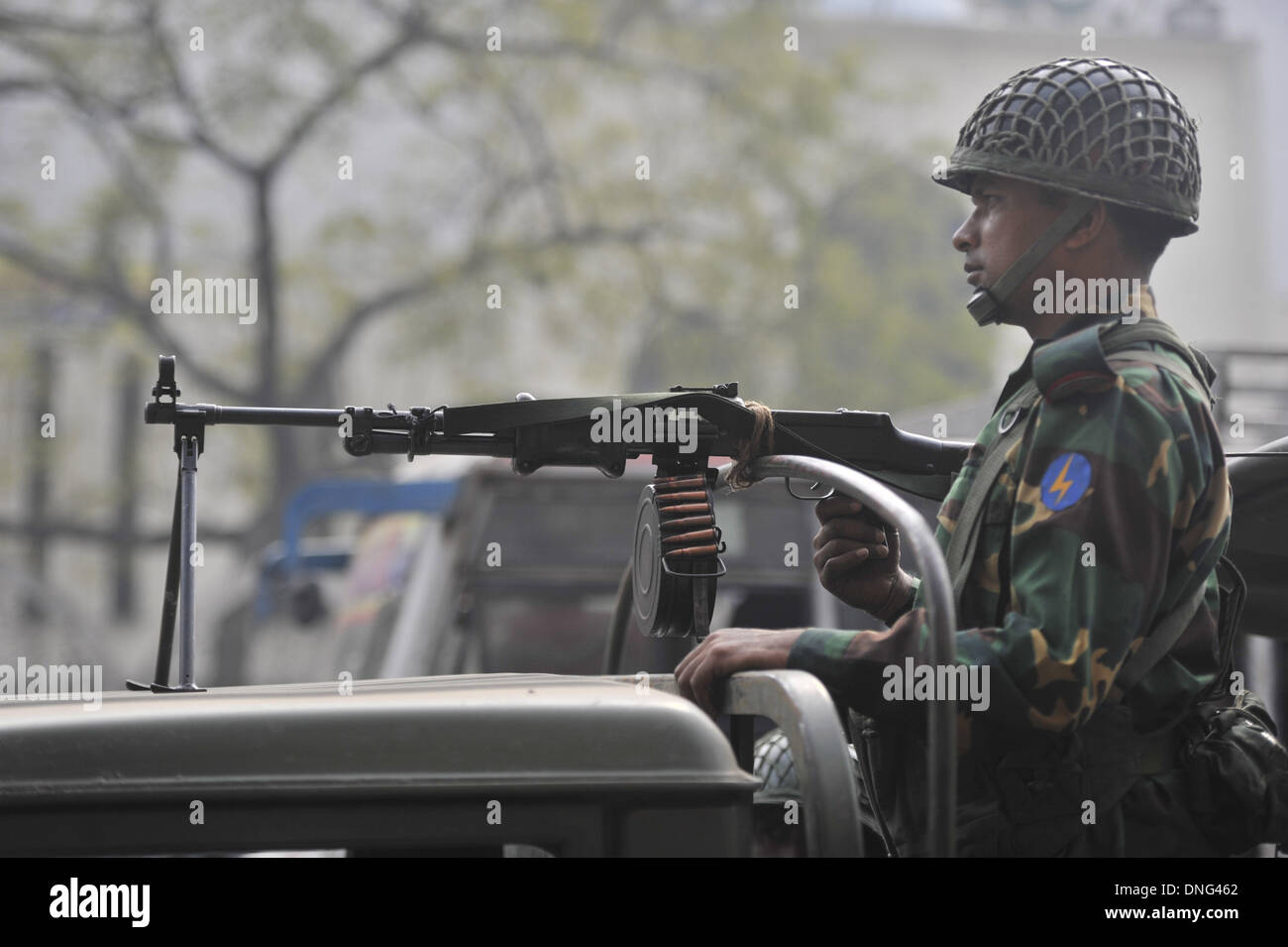 Dhaka, Bangladesh. 27th December 2013 An army soldier watch the